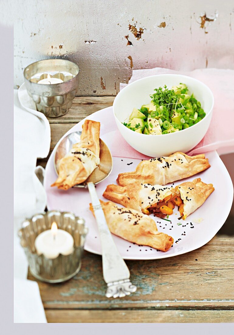 Stuffed puff pastry parcels filled with avocado salad for Christmas