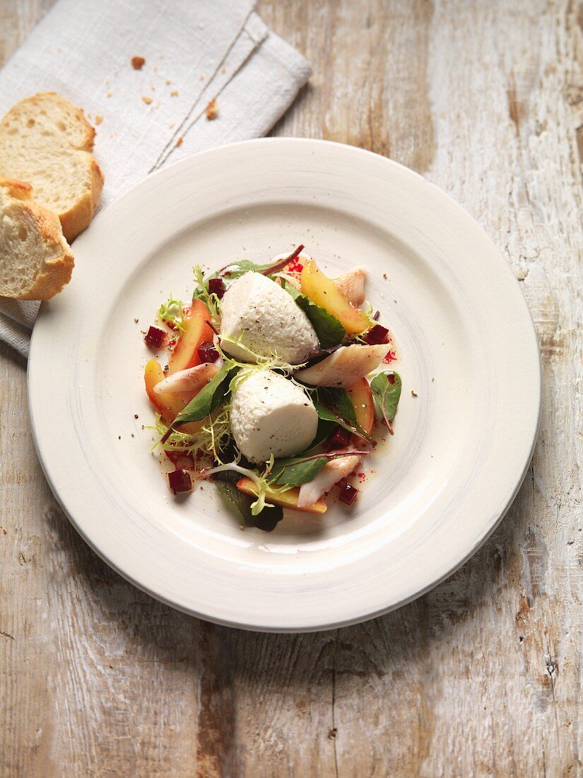 Smoked fish mousse on a salad