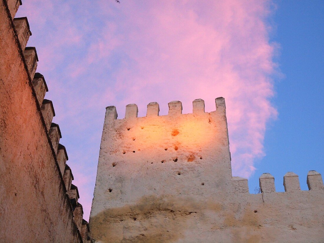 Sunset over the palace walls of the Medina of Fez, one of the four royal cities of Morocco