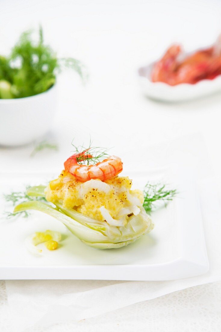 Fennel stuffed with corn polenta and prawns