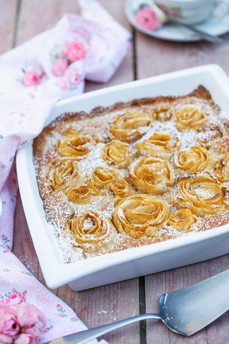 Apple rose tart with icing sugar