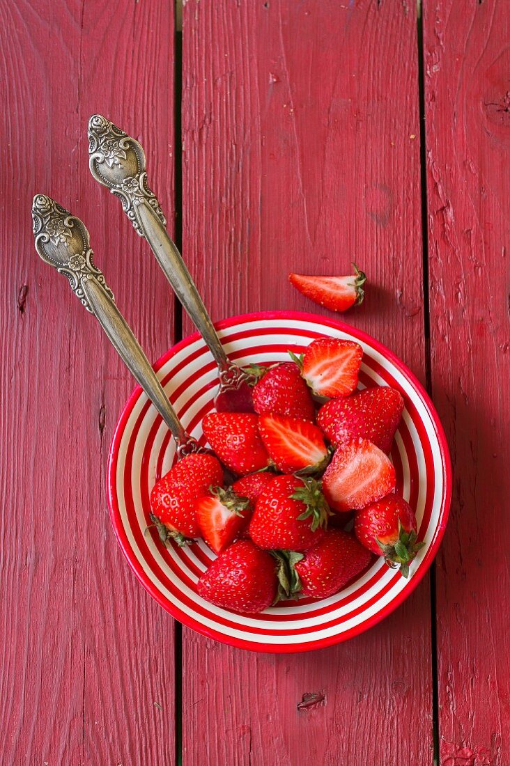Strawberries in a striped bowl