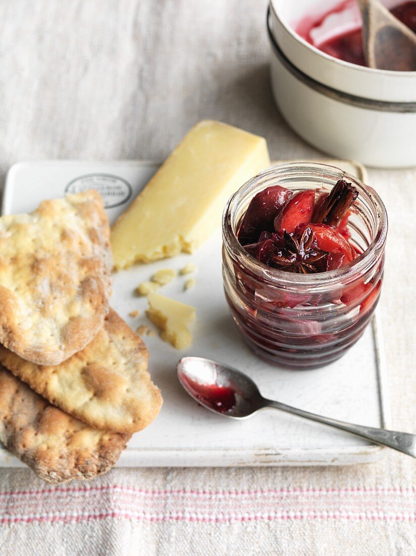 Spicy plum chutney served with hard cheese and unleavened bread