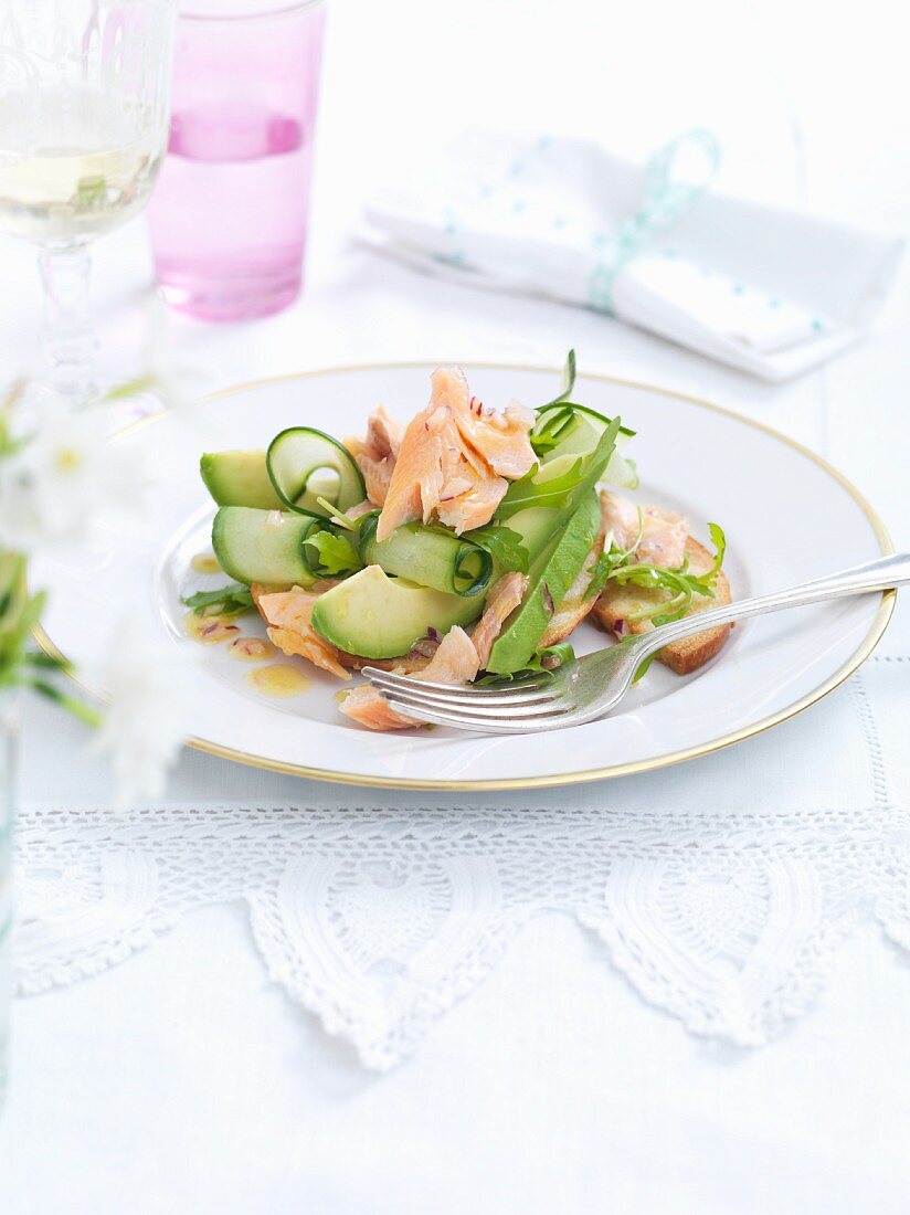 Salmon salad with cucumber and avocado for Easter