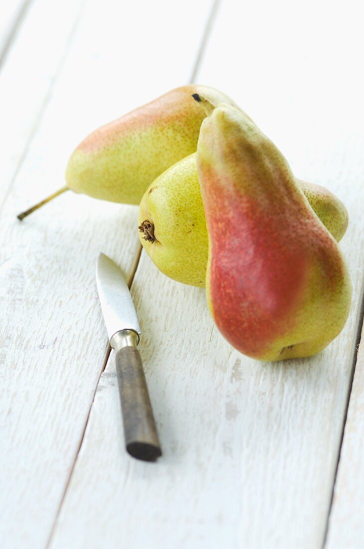 Pears and a peeling knife