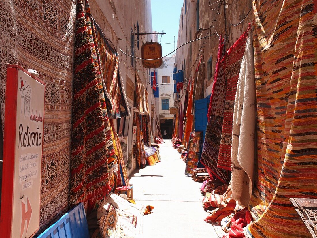 Rugs being sold in the alleys of Essaouira, , Morocco