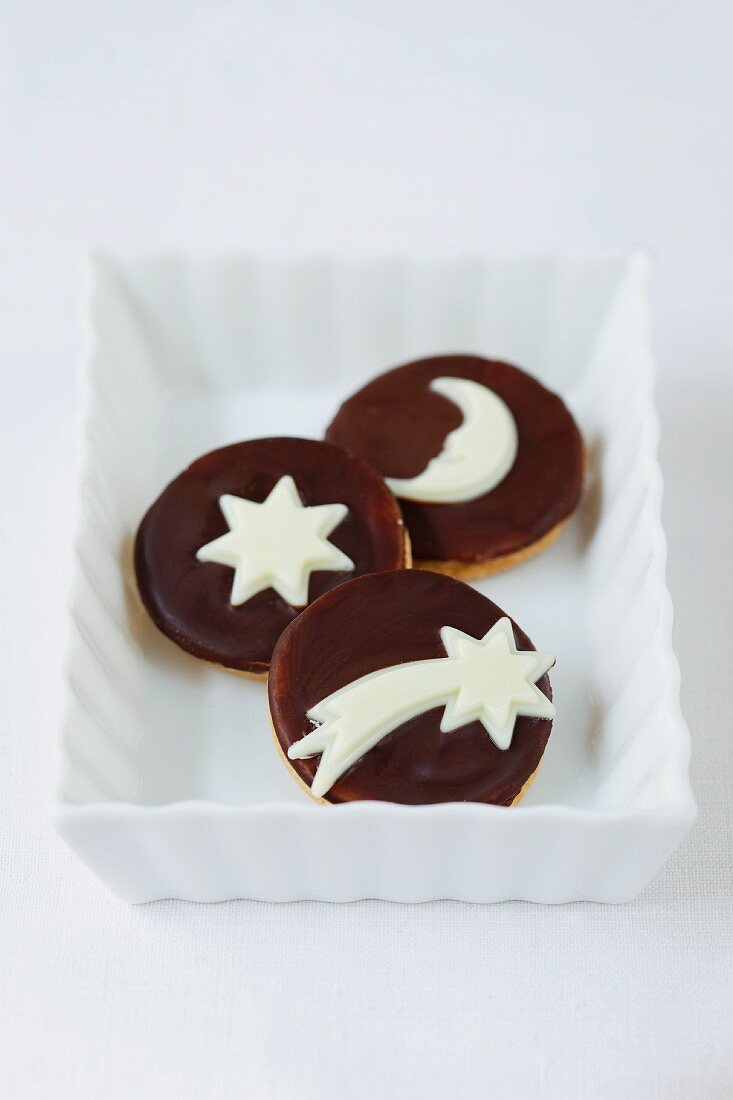 Chocolate biscuits decorated with stars and moons