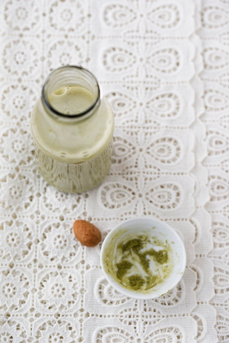 Homemade almond milk with matcha tea