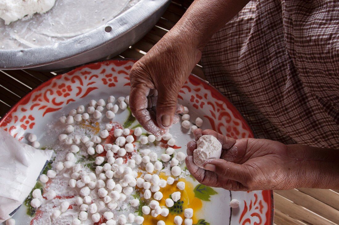 Rice balls for dessert being made, Thailand