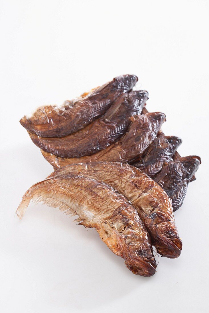 Dried fish on a white surface