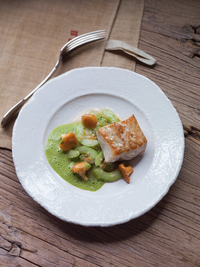 Sturgeon fillets with cucumbers and chanterelle mushrooms