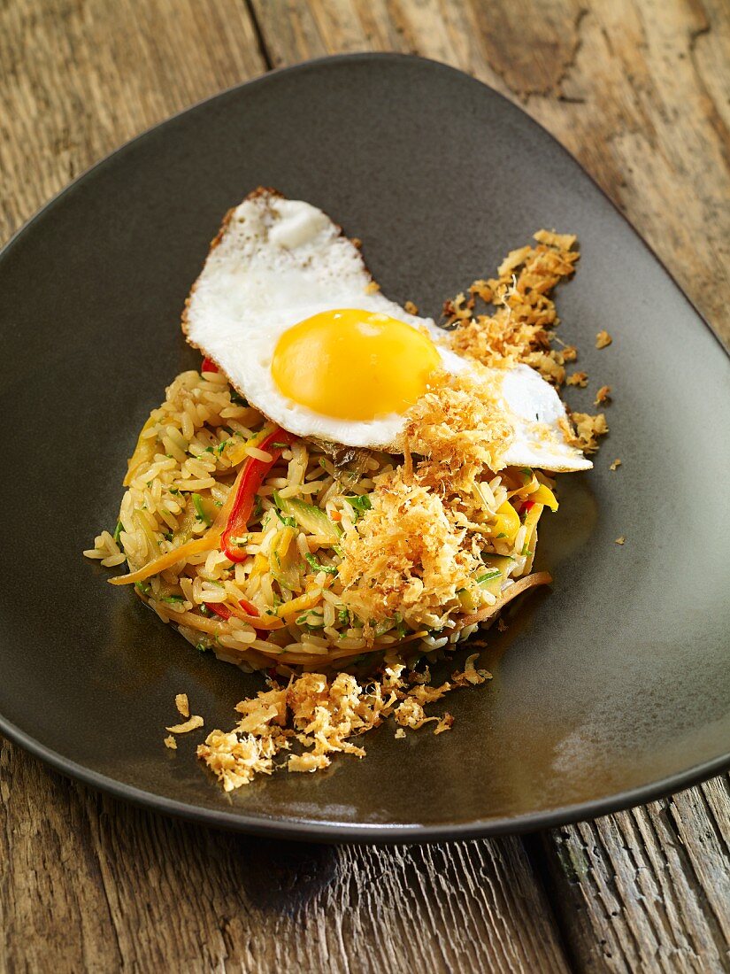 Fried vegetables rice with fried egg