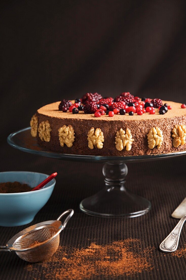 Chocolate mousse cake with walnuts and berries