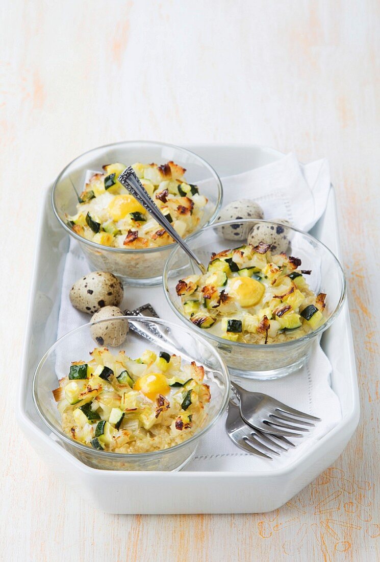 Gratinated quinoa with leek, courgettes and fried quail's eggs