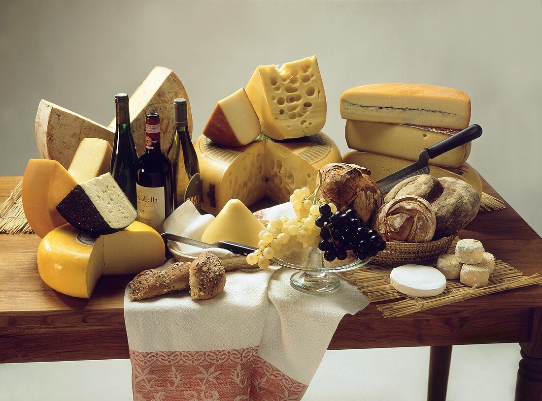 Large Assorted Cheese Still Life with Wine; Grapes