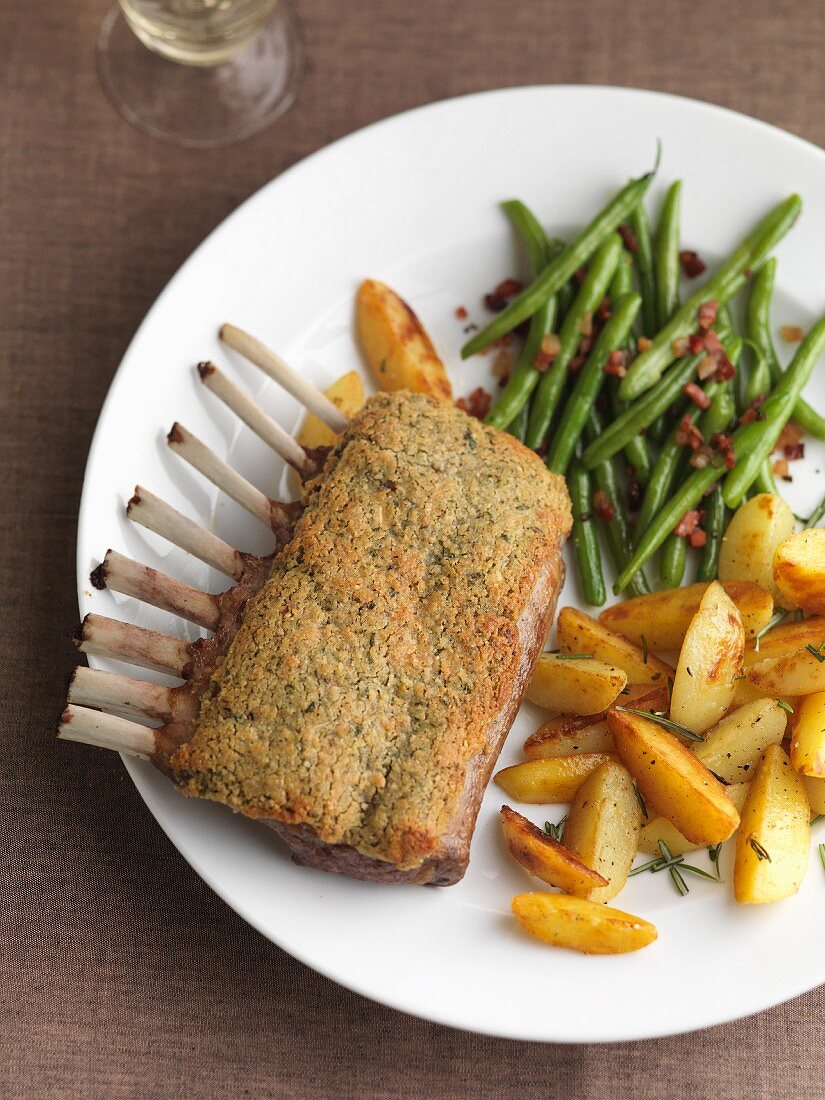 Rack of lamb with green beans and roast potatoes