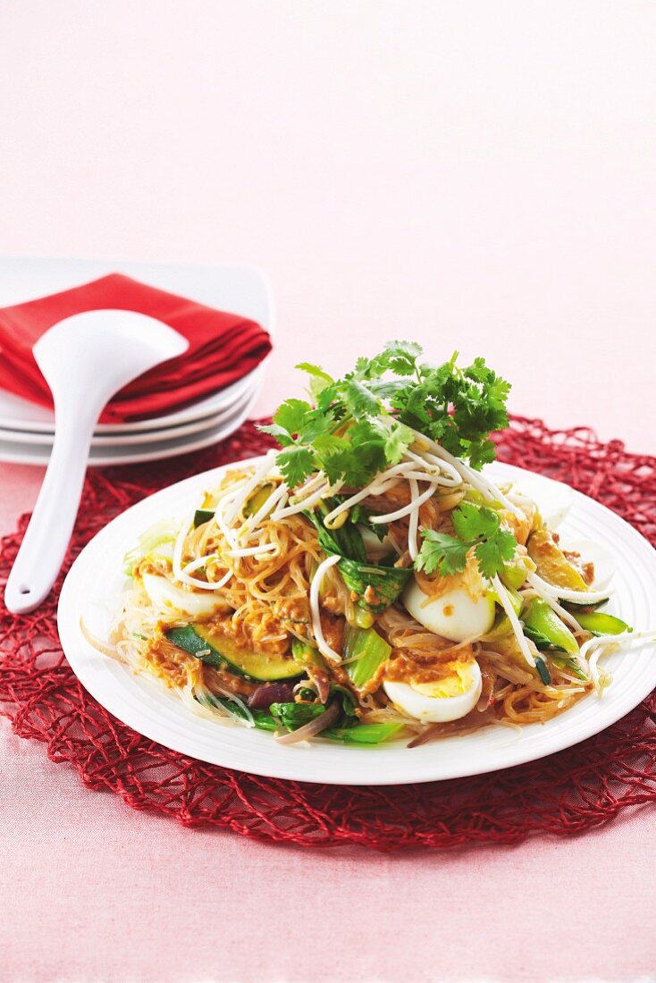 Rice vermicelli with satay sauce and hard-boiled eggs