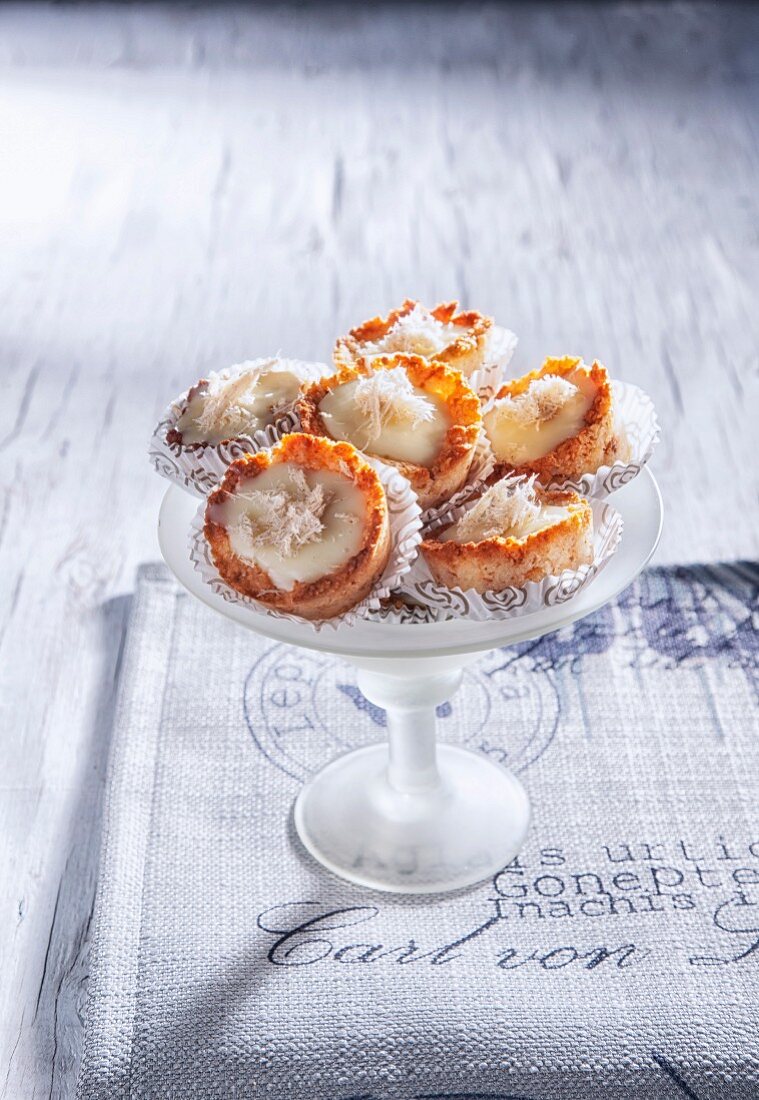 Coconut tartlets in paper cases