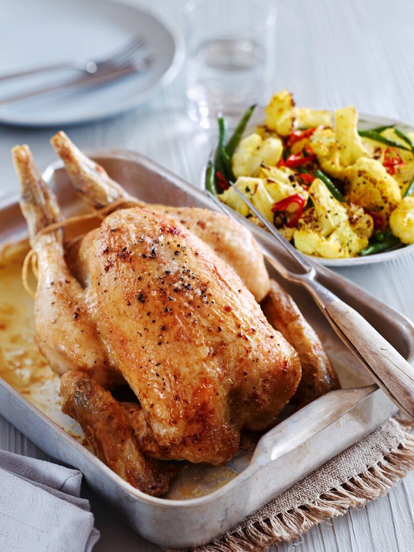 Roast chicken with a cauliflower salad