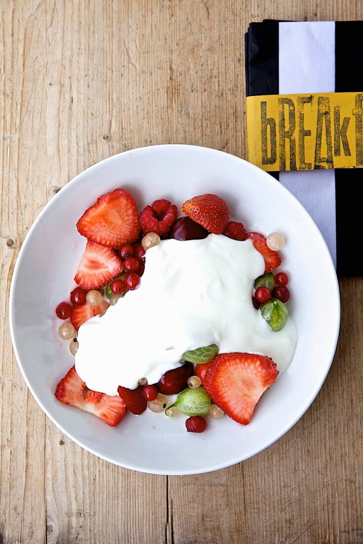 Yoghurt with fresh fruits for breakfast