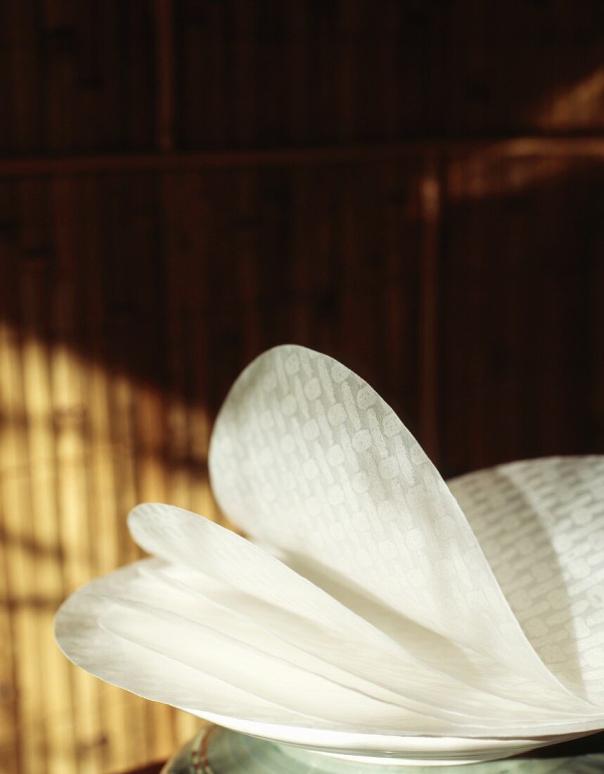 White rice paper in a white bowl