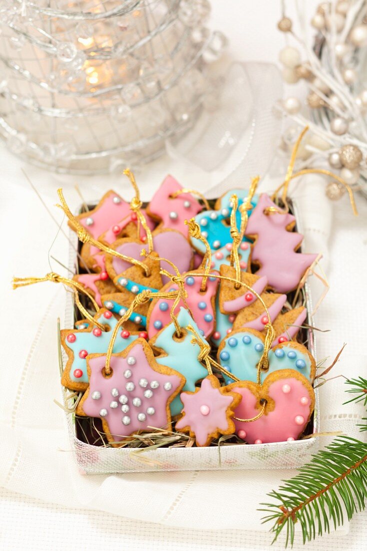 Gingerbread biscuits decorated with pastel coloured icing