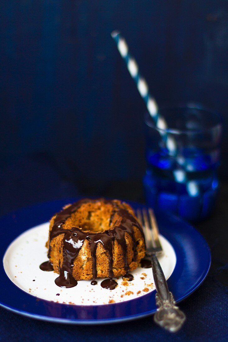 A mini Bundt cake with chocolate sauce