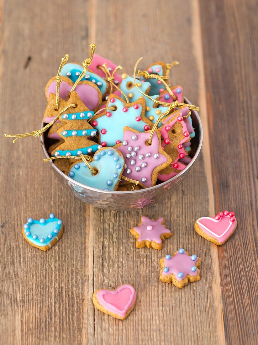 Gingerbread decorated with colourful icing and sugar pearls as Christmas tree decorations