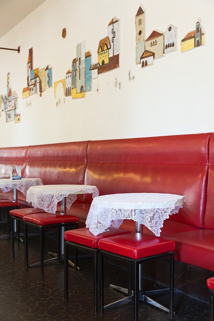 The 'Bambi Eszpresso' cafe on the Buda side of Budapest – benches and stools upholstered in artificial red leather