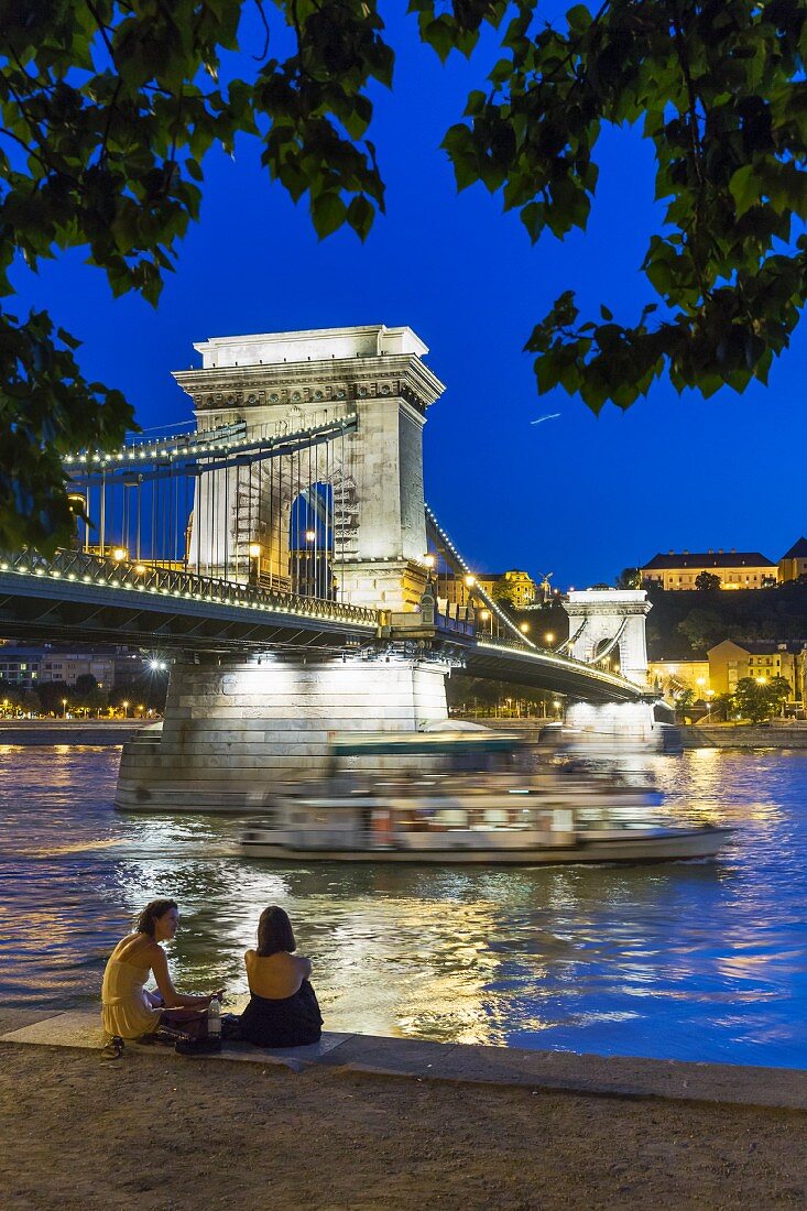 A view from the Pest Bank of the 380 metre long Chain Bridge at dusk, Budapest, Hungary