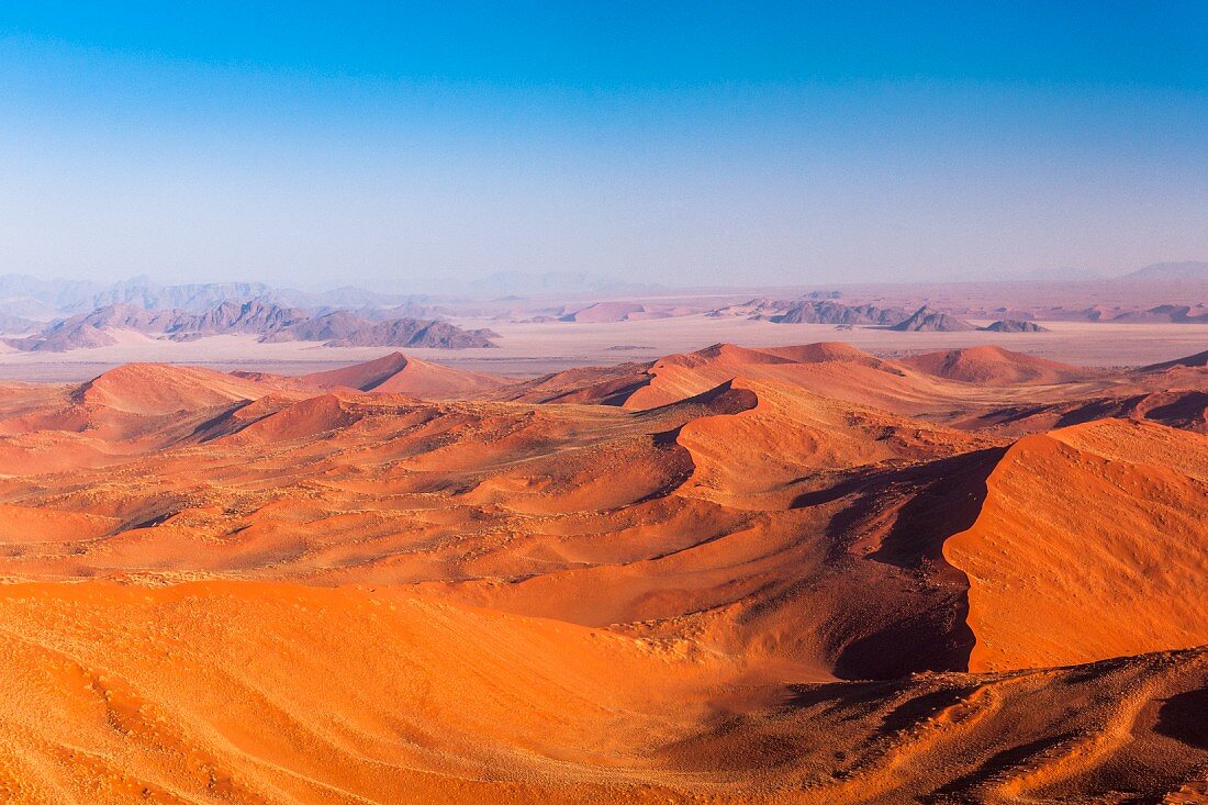 Dunes in the Sossusvlei pan in the Namibian desert – part of the Naukluft National Parks, Namibia, Africa