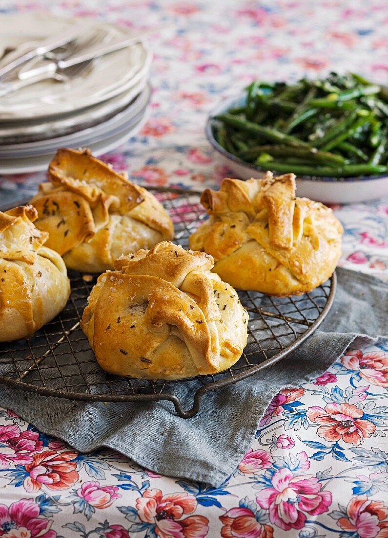 Lamb and rosemary parcels with sauteed greens