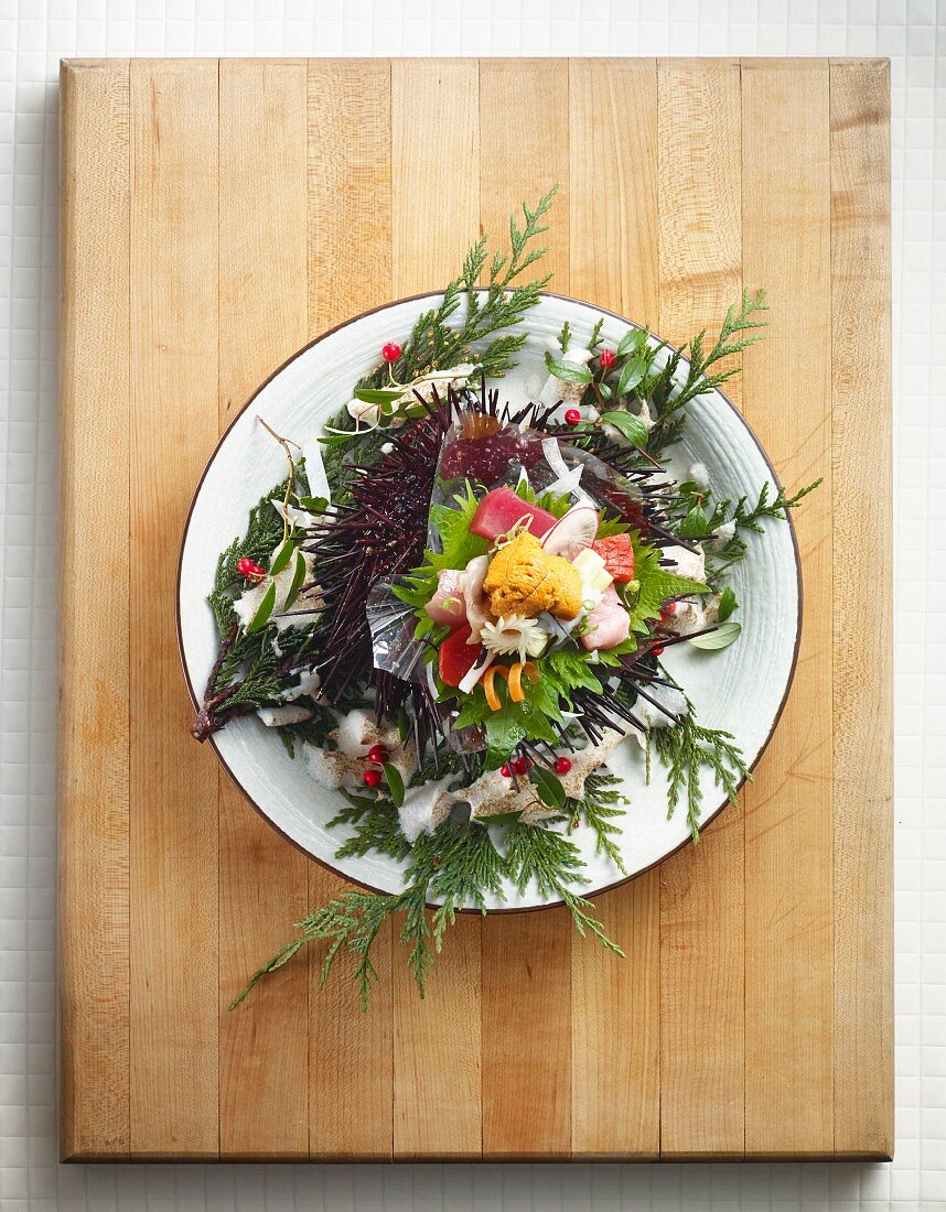 Sea urchin sashimi with edible flowers (Japan)