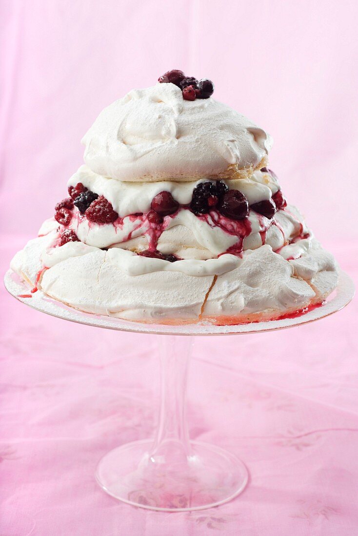 A wedding cake with red fruit