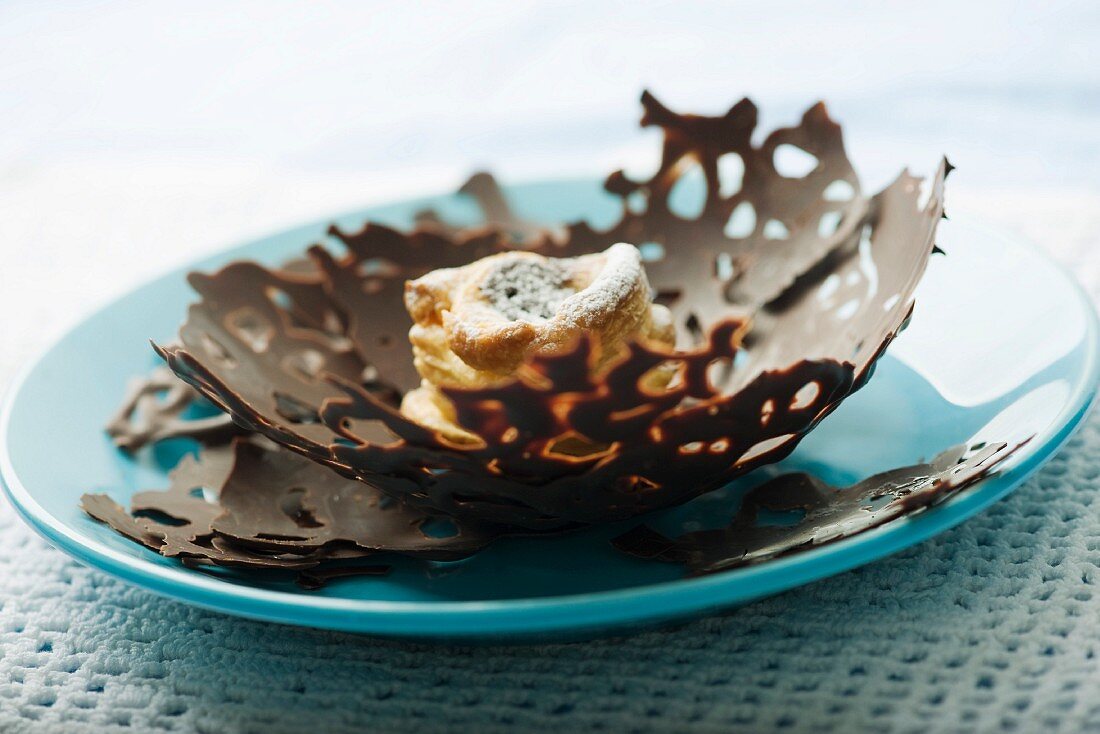 Puff pasty in a chocolate basket