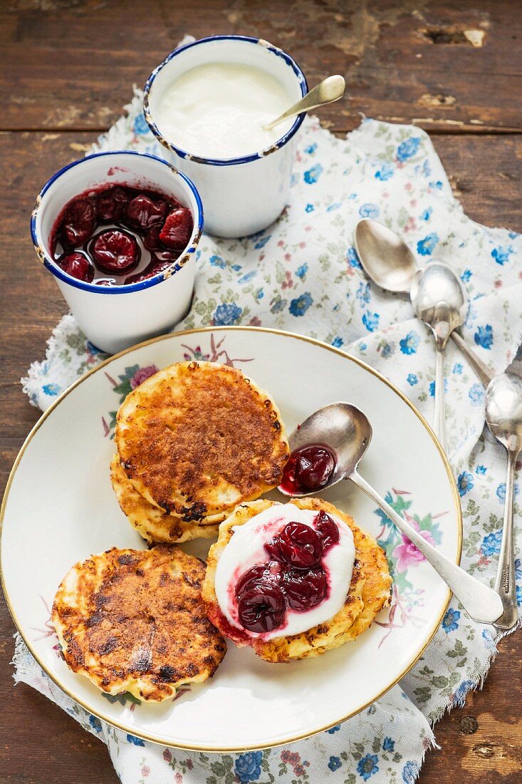 Russian ricotta pancakes with cherry compote