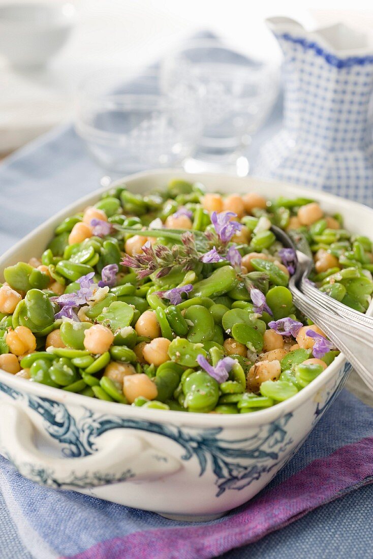Fava bean and chickpea salad with edible flowers and sage