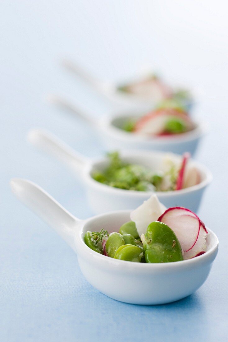 Broad bean salad with radishes and goat's cheese