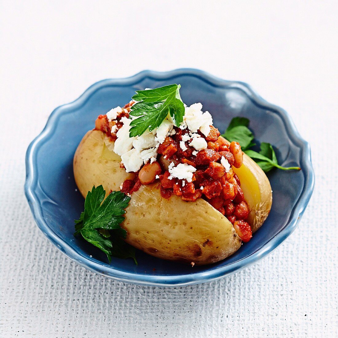 Baked potato with bacon and beans