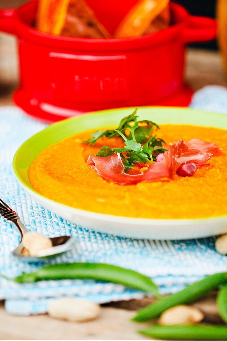Pumpkin soup with bacon and herbs