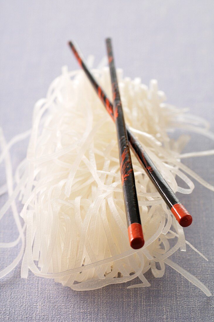 Dry rice noodles and chopsticks