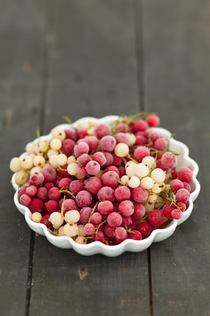 Frozen white and redcurrants