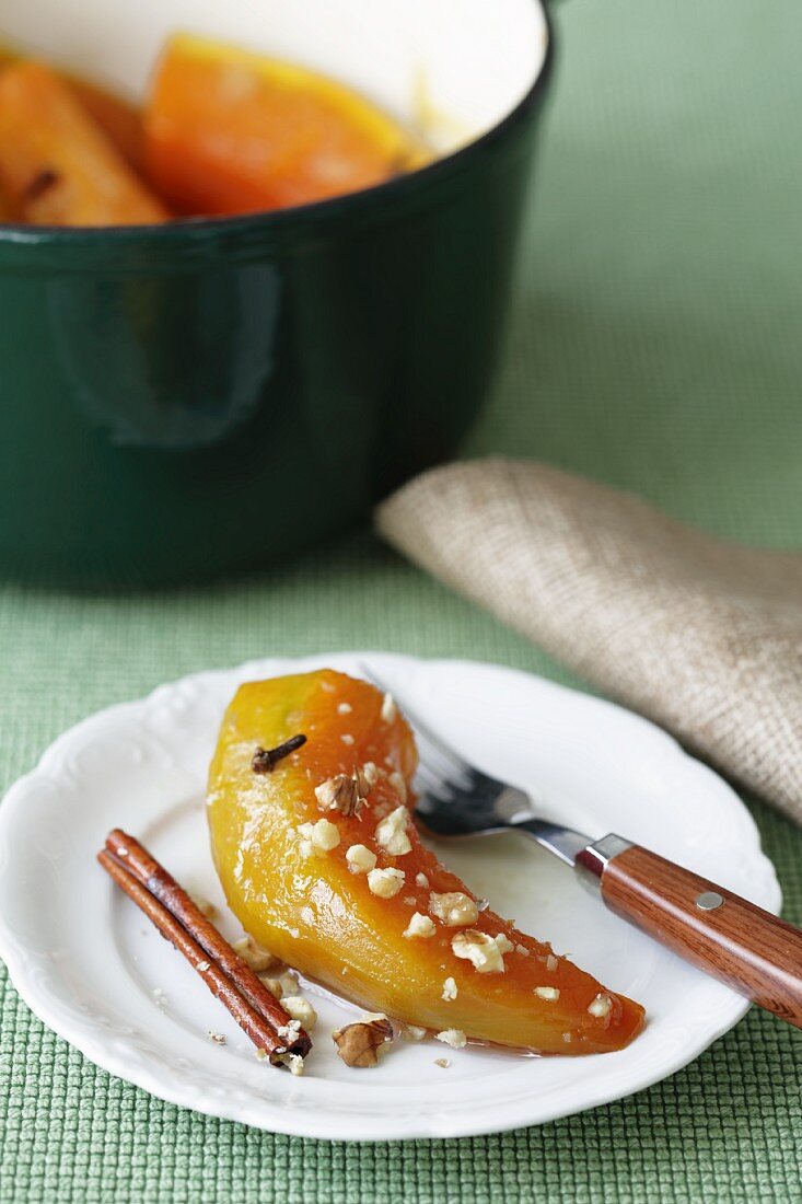 Pumpkin in honey sauce with cinnamon and nuts