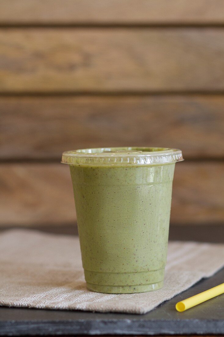 A smoothie made with kale, spinach, coconut water, bananas and chia seeds