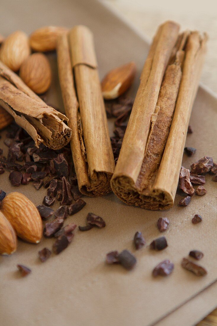 Cinnamon sticks, almonds and cacao nibs