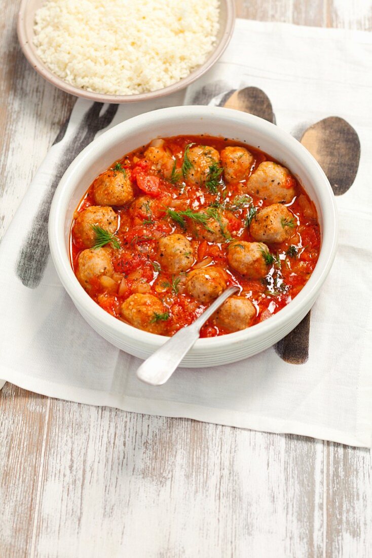 Beef meatballs in tomato sauce with cauliflower couscous