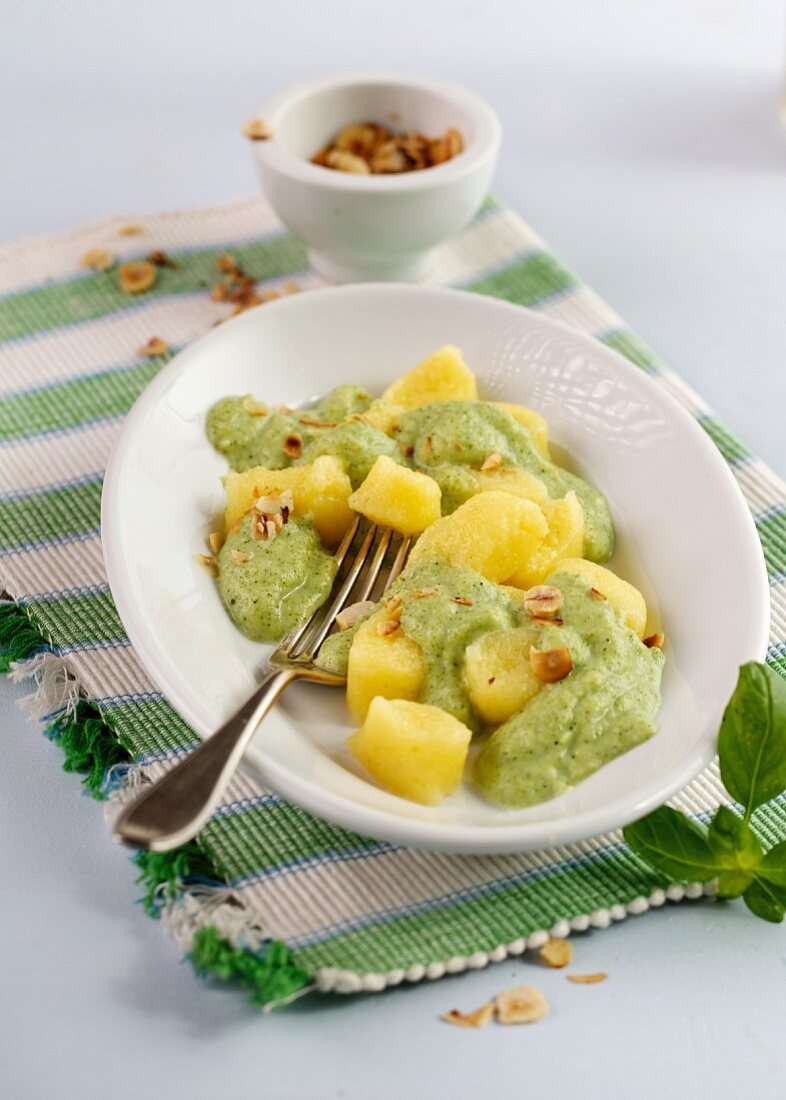 Gnocchi with broccoli sauce and hazelnuts