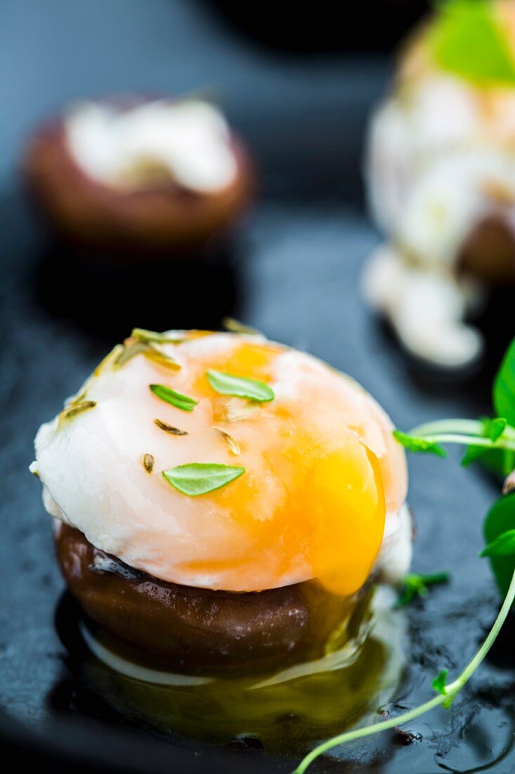 Mushrooms sautéed in white wine and thyme filled with goat's cheese and quail's eggs