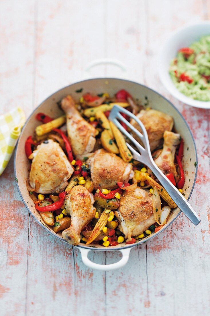 Roasted vegetable chicken with sweetcorn, peppers, avocado and potatoes