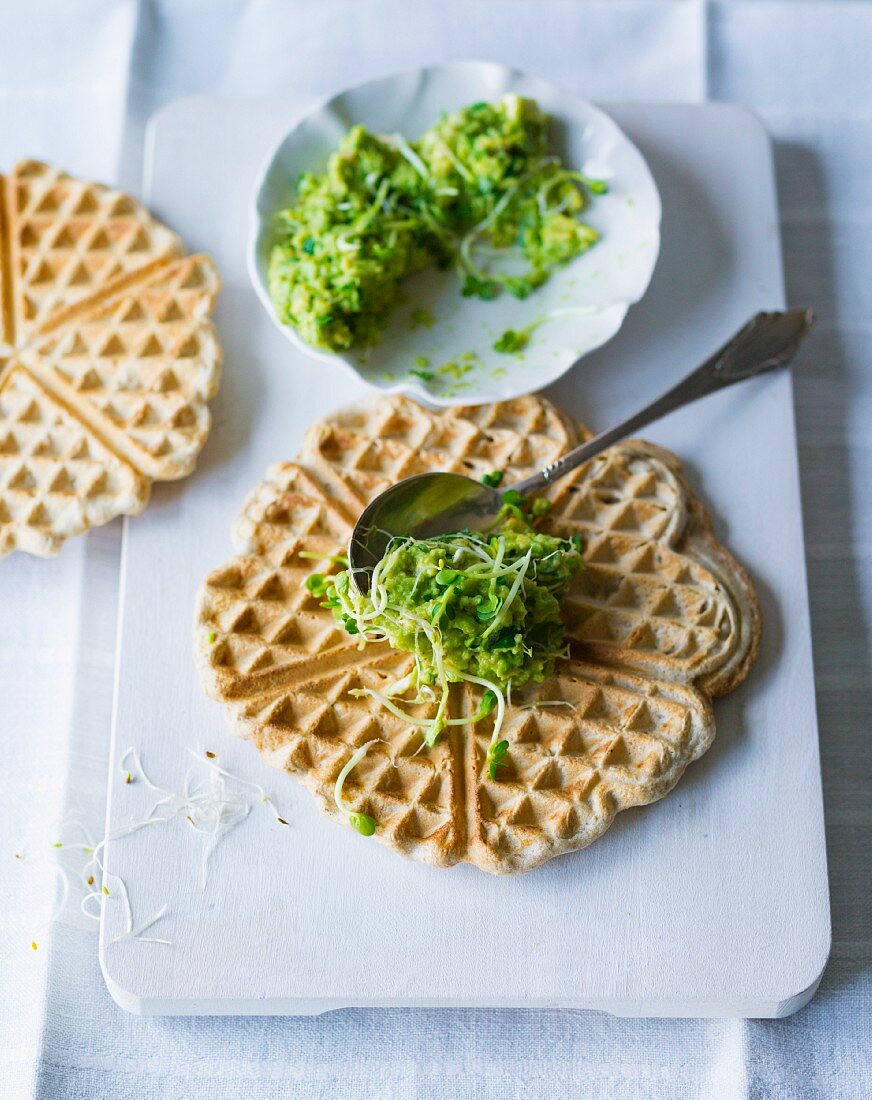 Waffles with avocado and beansprout cream